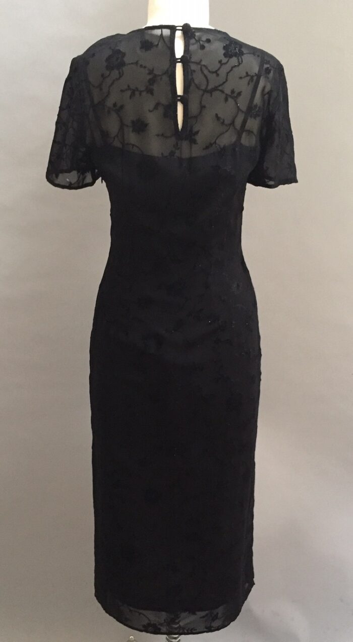 black tea length dress with sleeve